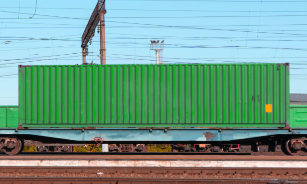 Green train car outlines rail transportation options